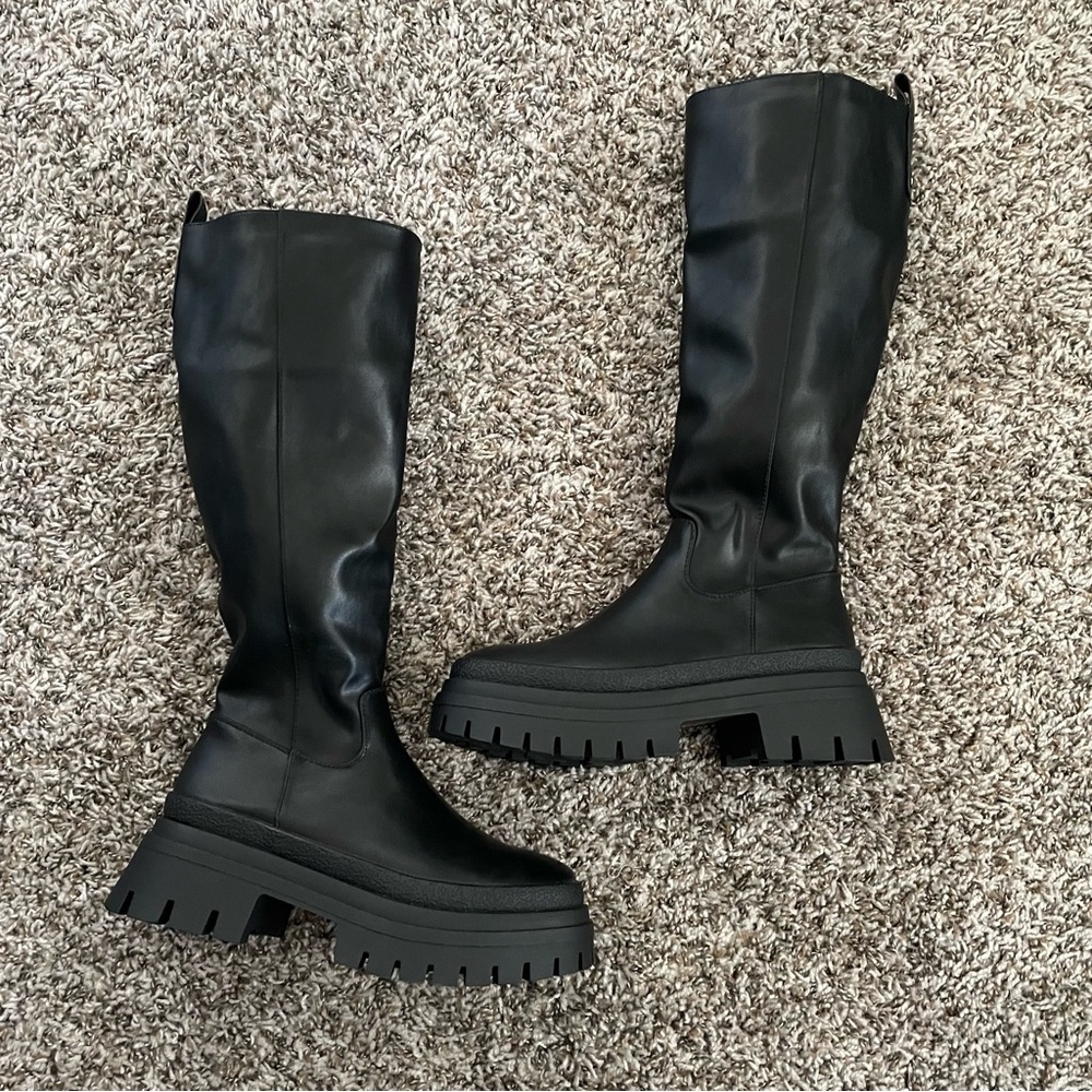 Black chunky knee high boots